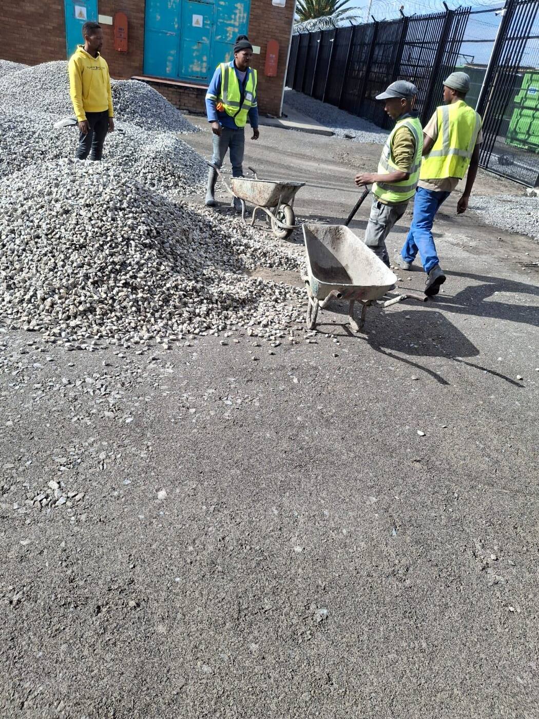 Aggregate stockpiles and labour preparation for substation works