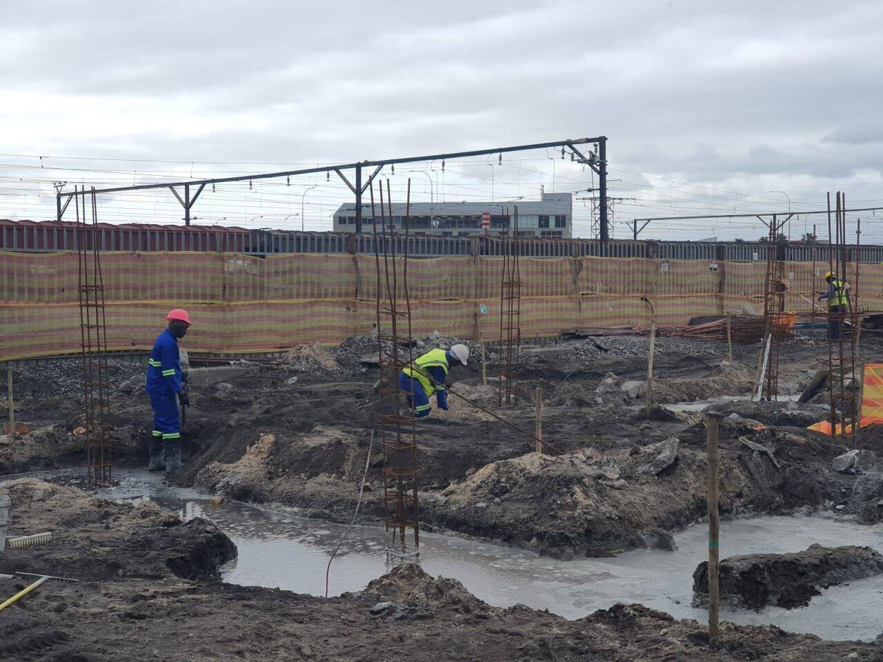 Foundation excavation and concrete pour adjacent to live rail corridor