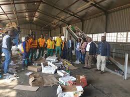 Waste sorting team at the materials recovery facility