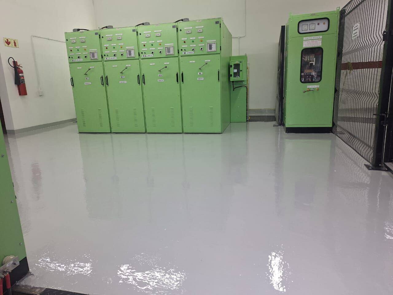 Nolungile substation control room with green switchgear panels