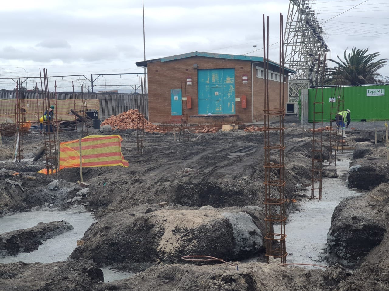 Column rebar starters and excavation works in front of existing relay room building at Paarden Eiland